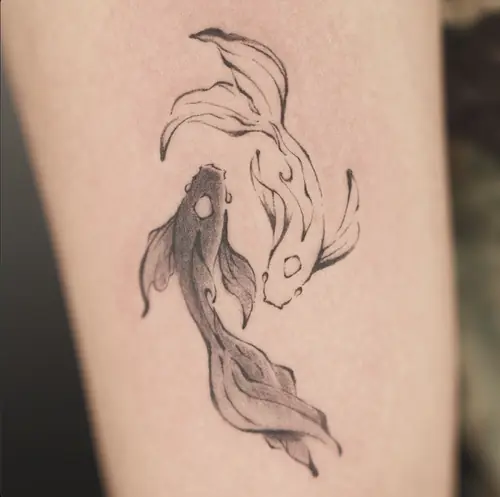 Ink-wash goldfish pair tattoo, sumi-e style by Maiku — WA Tattoo Las Vegas