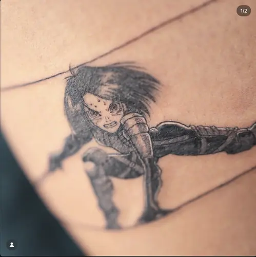 Black and grey Alita anime tattoo by Maiku — WA Tattoo Las Vegas