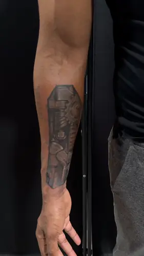 Sculptural forearm tattoo by Vina — WA Tattoo Las Vegas