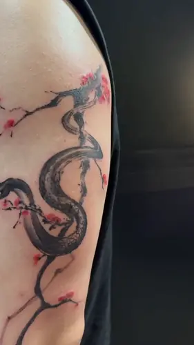 Snake and plum blossom color arm tattoo by Vina — WA Tattoo Las Vegas