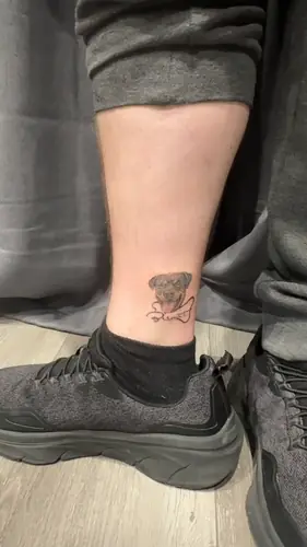 Rottweiler pet portrait ankle tattoo by Vina — WA Tattoo Las Vegas